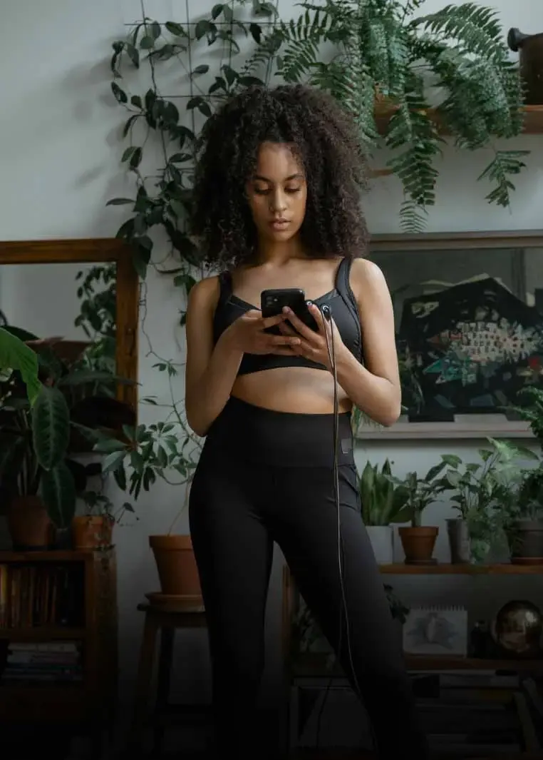 Girl listening to music while exercising