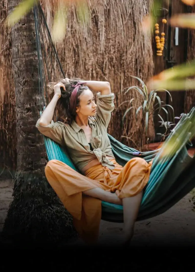 Girl relaxing in hammock